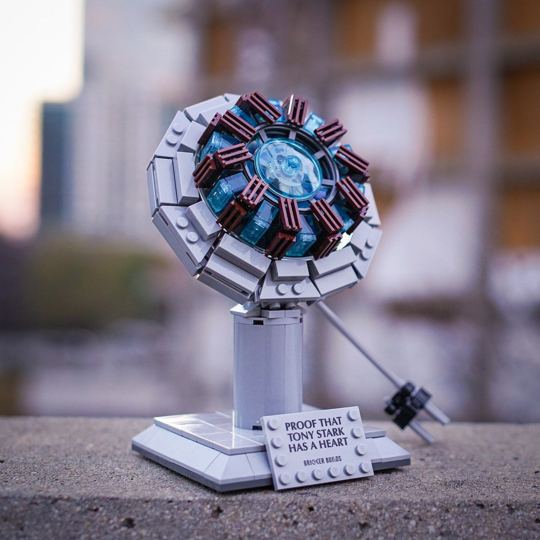Tony Stark's Arc Reactor Life-Sized Replica built with LEGO® bricks - by Bricker Builds in a city scape 