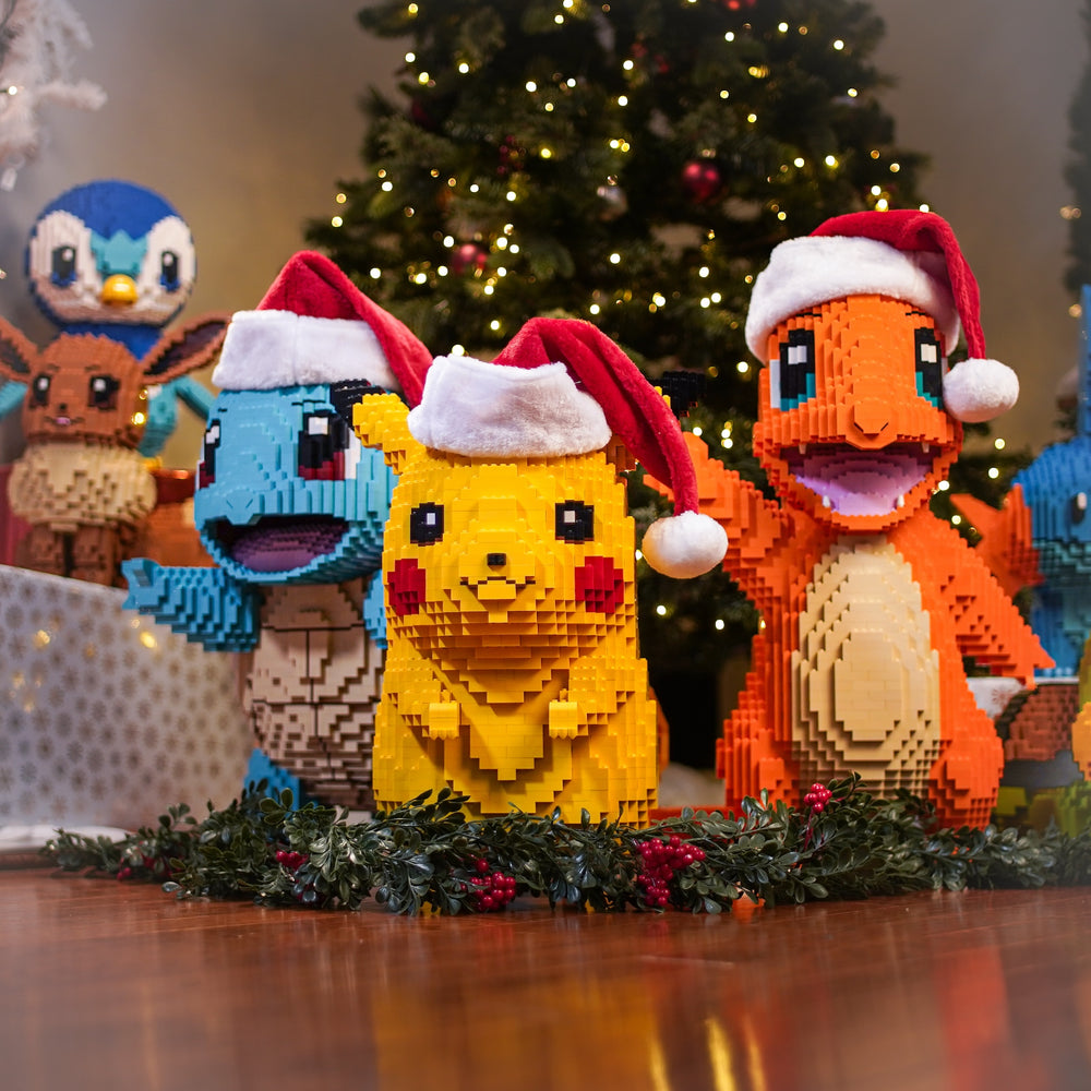 Electric Mouse and Pocket Monsters made of LEGO® Bricks in front of a christmas tree by Bricker Builds