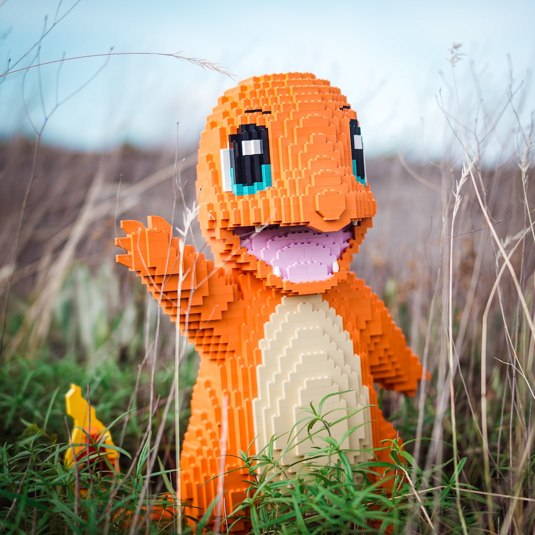 Fire Lizard Life-Sized Sculpture built with LEGO® bricks - Bricks & Instructions + FREE Light Kit by Bricker Builds - in a field