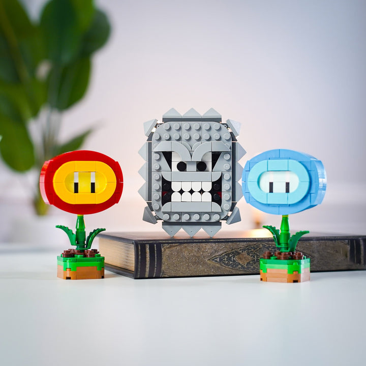 Mini Angry Block and Fire and Ice Flowers in LEGO Bricks by Bricker Builds Lifestyle Together with a Book
