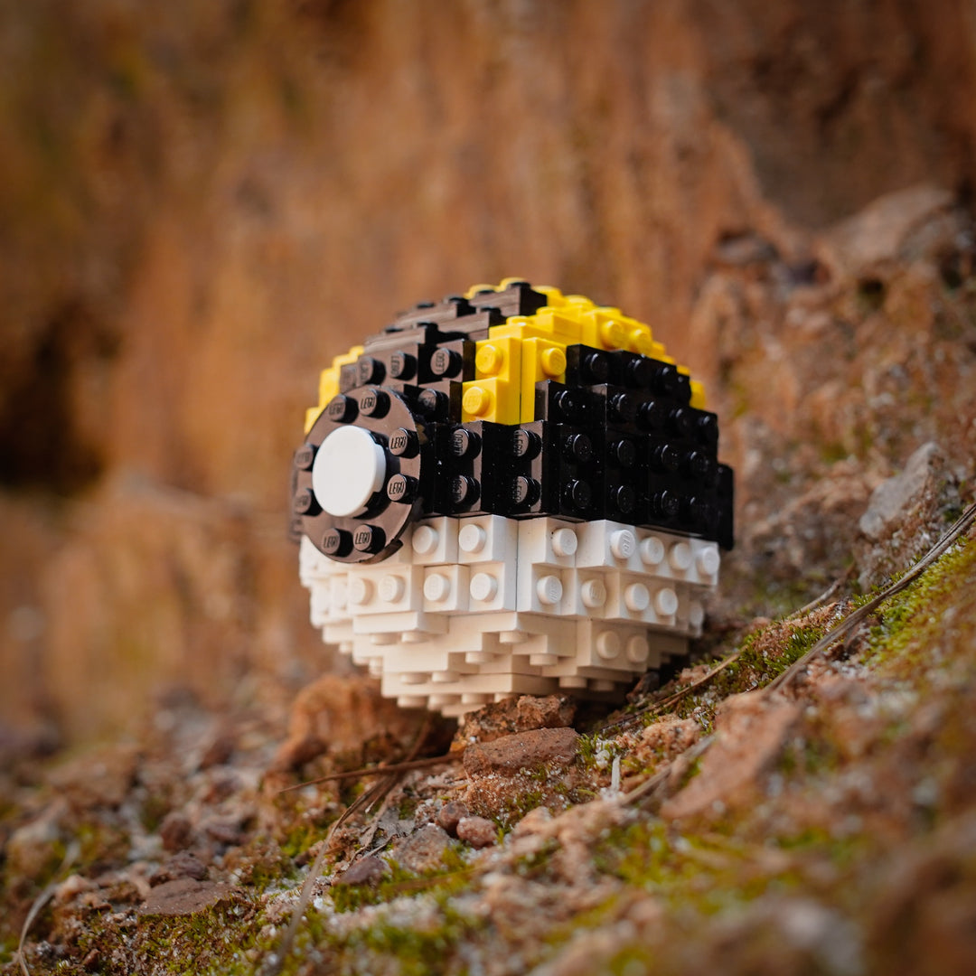 Ultra Pocket Sphere in LEGO Bricks by Bricker Builds on mossy rock cliff side