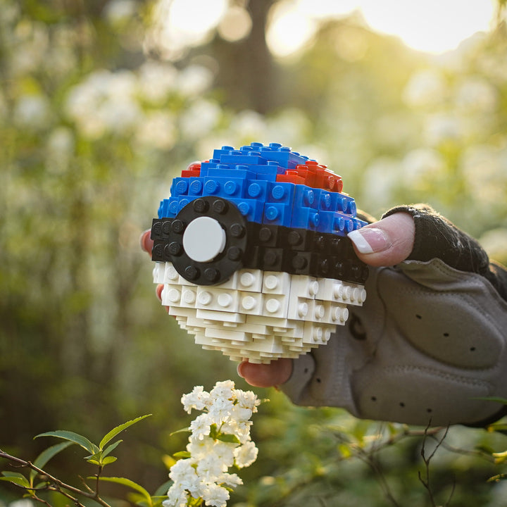 Great Pocket Sphere in LEGO Bricks by Bricker Builds held by trainer in woods