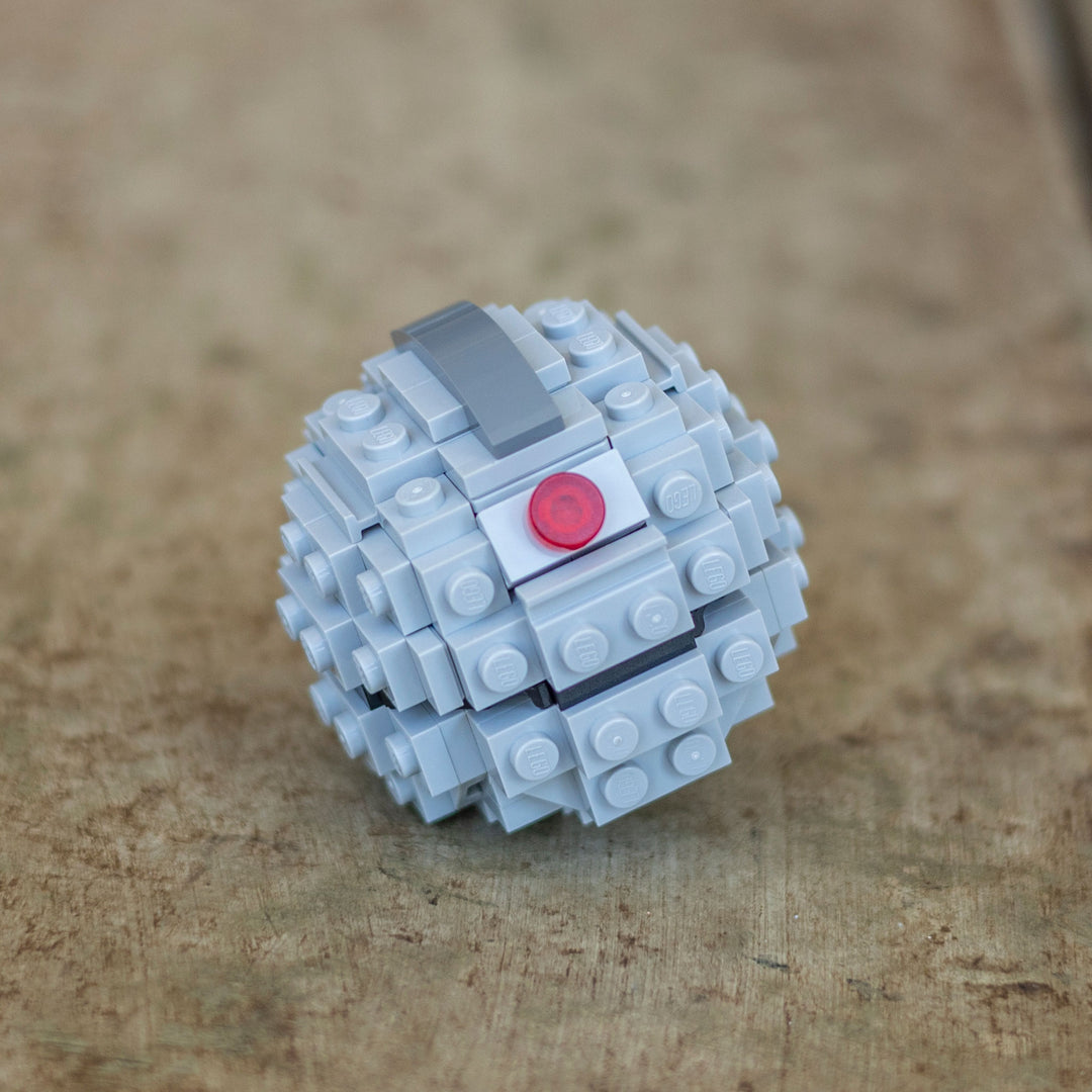 EMP Grenade by Bricker Builds made of LEGO Bricks on a table