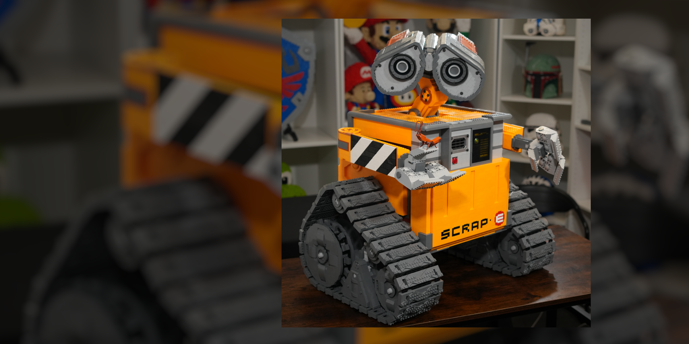 SCRAP-E premium LEGO® brick custom display model featuring articulated arms, movable head, opening compartment, and custom lighting.