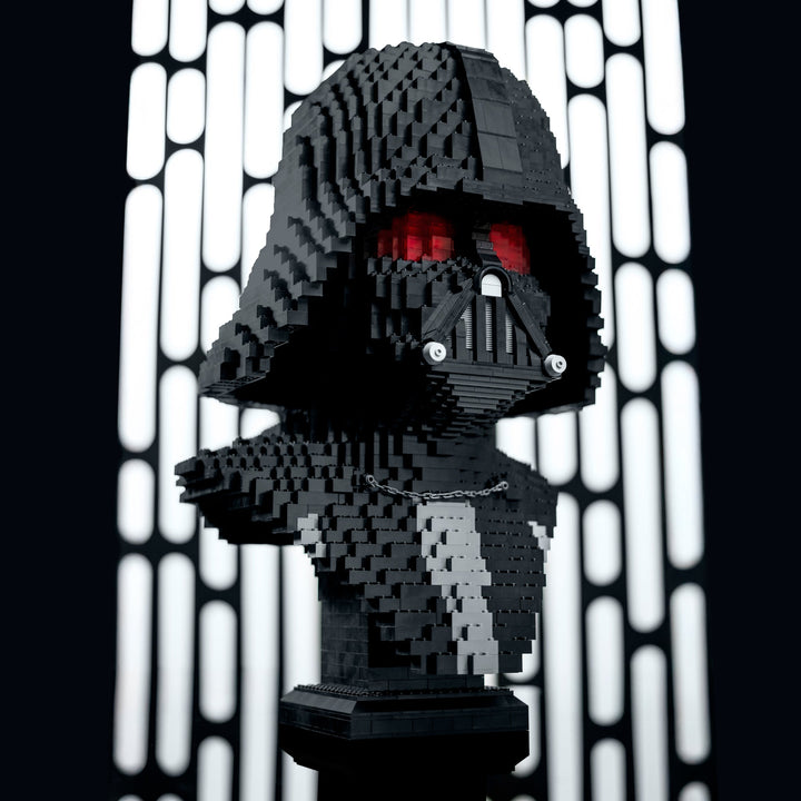 Lord Vader Bust by Bricker Builds Made of LEGO Bricks in a red studio setting